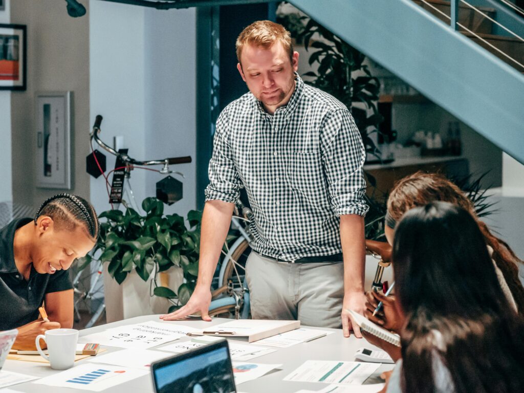 Team strategy meeting during organizational growth